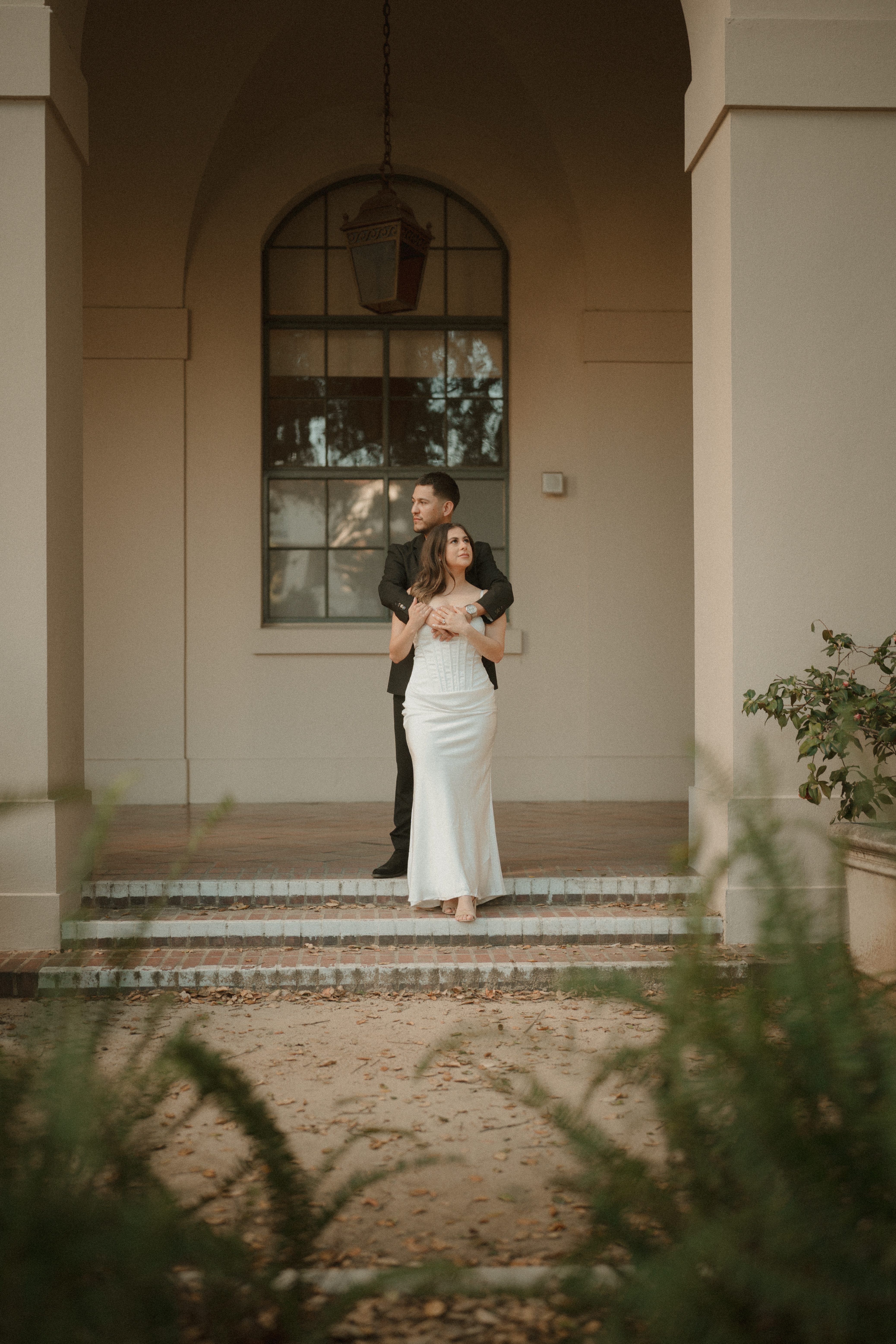Christine and Rudy walking and kissing